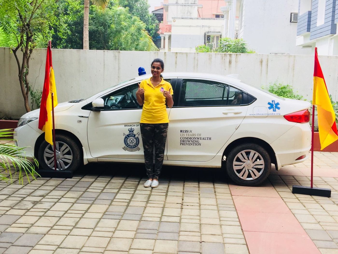 Outreach vehicle with lifeguard flags