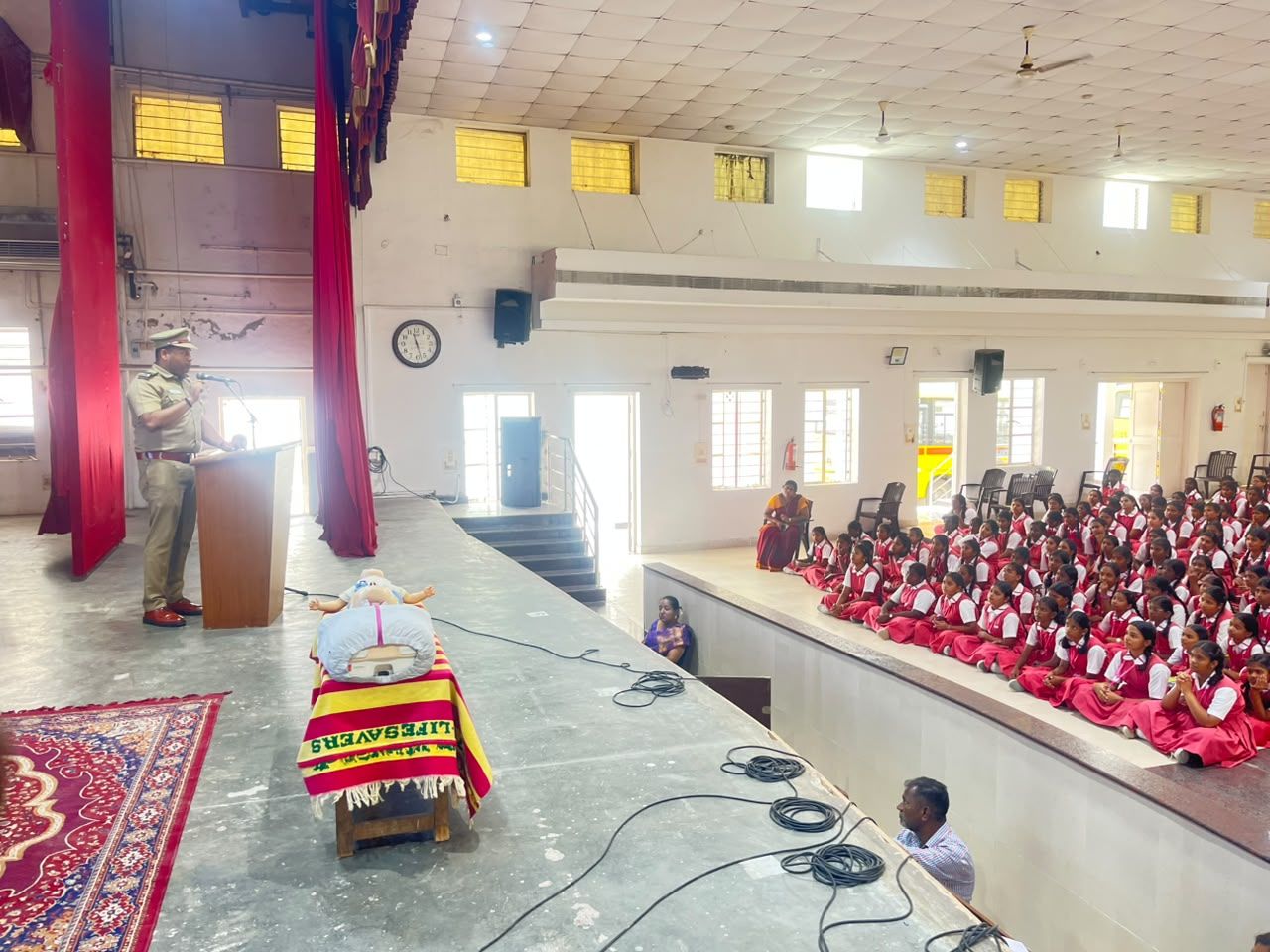 CPR demonstration on stage for students