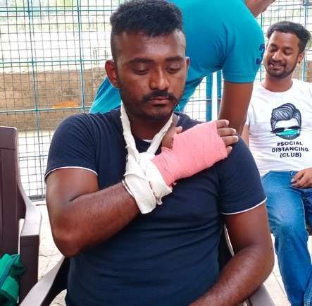 A trainee wearing an arm sling during first aid practice