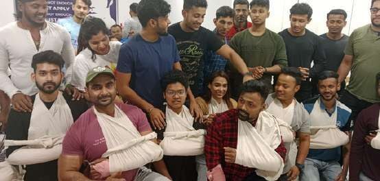 A group of trainees wearing slings and bandages