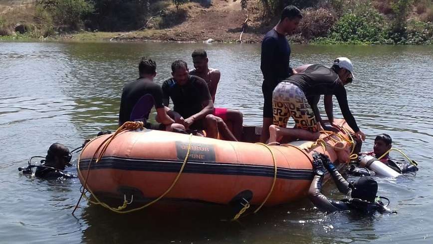 Rescue divers and an inflatable boat during flood rescue training